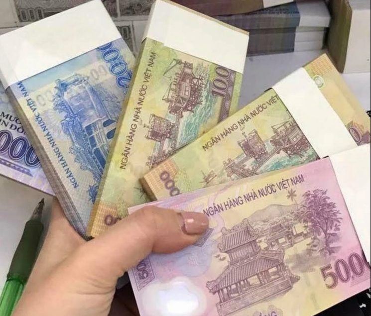 Đổi tiền lì xì Tết COI CHỪNG tiền mất, tật mang